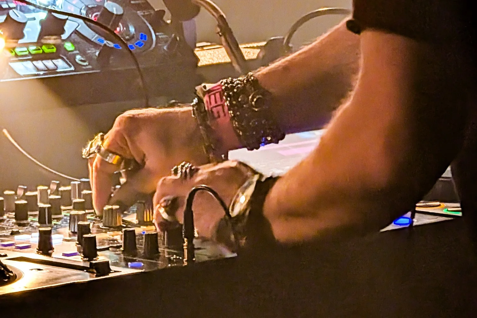 Close-up of a DJ working a mixer